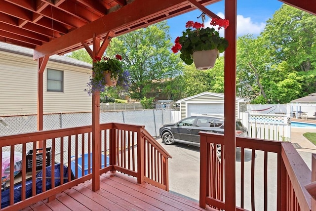66 Adams St, Revere, MA 02151 - wooden deck featuring an outdoor structure
