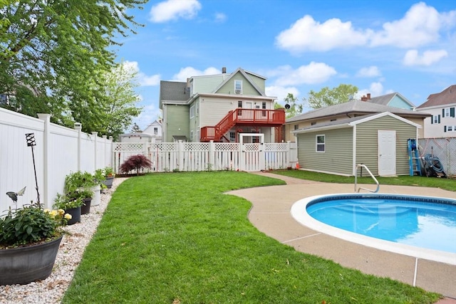 66 Adams St, Revere, MA 02151 - view of swimming pool with a fenced backyard, a patio area, and a storage shed