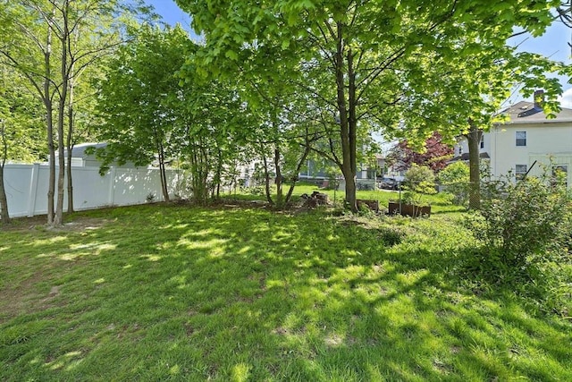 view of yard with fence