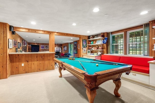 game room featuring light carpet, wood walls, and recessed lighting