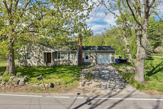 367 Main St, Hampstead, NH 03841 - ranch-style house with an attached garage, concrete driveway, a front yard, and a chimney