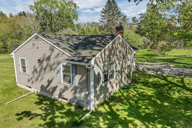 367 Main St, Hampstead, NH 03841 - view of property exterior featuring a chimney, a yard, and roof with shingles
