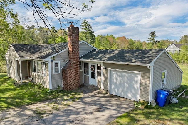 367 Main St, Hampstead, NH 03841 - view of front facade featuring a garage, a chimney, and asphalt driveway