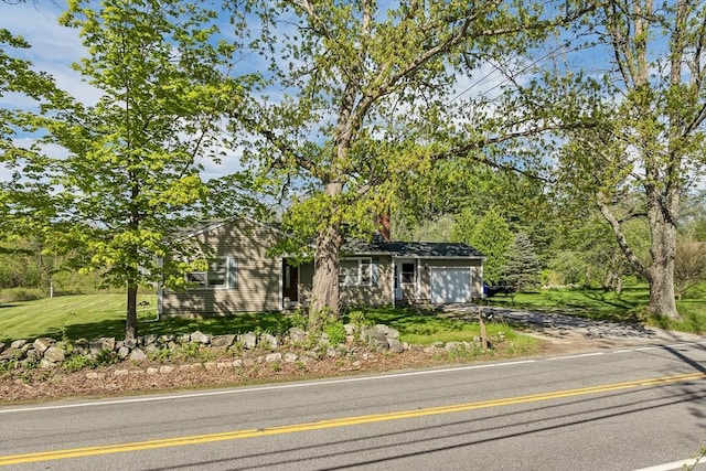 367 Main St, Hampstead, NH 03841 - view of front of home featuring an attached garage, a front yard, and driveway