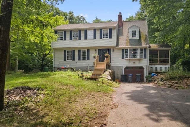 110 Northbridge Rd, Mendon, MA 01756 - view of front of property featuring driveway, a sunroom, a chimney, and a garage
