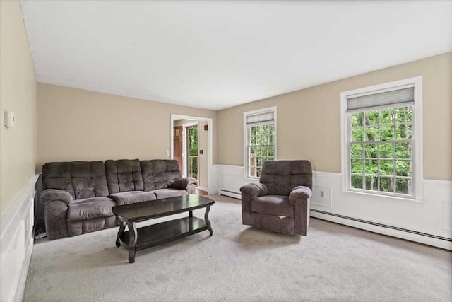 110 Northbridge Rd, Mendon, MA 01756 - carpeted living area featuring a wainscoted wall and a baseboard radiator