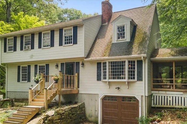 110 Northbridge Rd, Mendon, MA 01756 - view of front of home featuring a garage, a chimney, and cooling unit