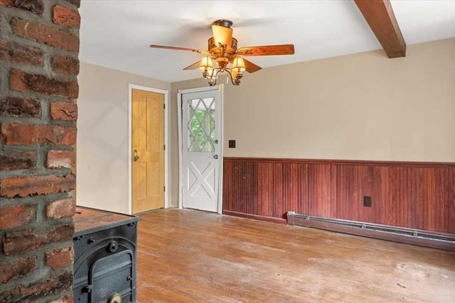 110 Northbridge Rd, Mendon, MA 01756 - foyer entrance featuring a baseboard heating unit, wood finished floors, a wainscoted wall, beam ceiling, and a ceiling fan