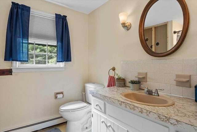 110 Northbridge Rd, Mendon, MA 01756 - full bathroom with a baseboard radiator, vanity, toilet, and tasteful backsplash