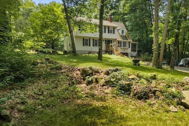 110 Northbridge Rd, Mendon, MA 01756 - view of front of home with a chimney and a front lawn