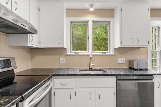 110 Northbridge Rd, Mendon, MA 01756 - kitchen featuring appliances with stainless steel finishes, under cabinet range hood, a sink, white cabinetry, and dark stone counters