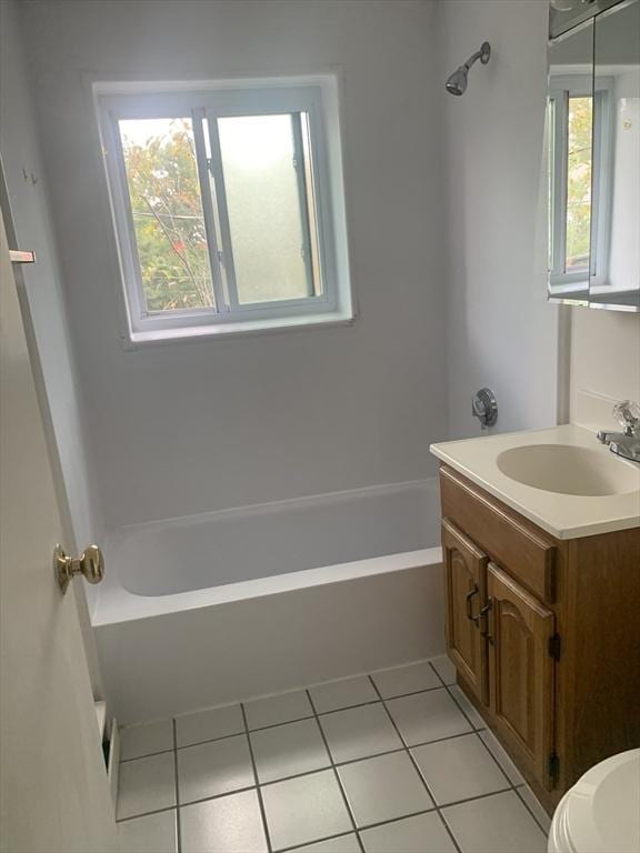 22 Bryon Rd Unit 3, Boston, MA 02467 - full bathroom featuring tile patterned floors, a tub to relax in, and vanity