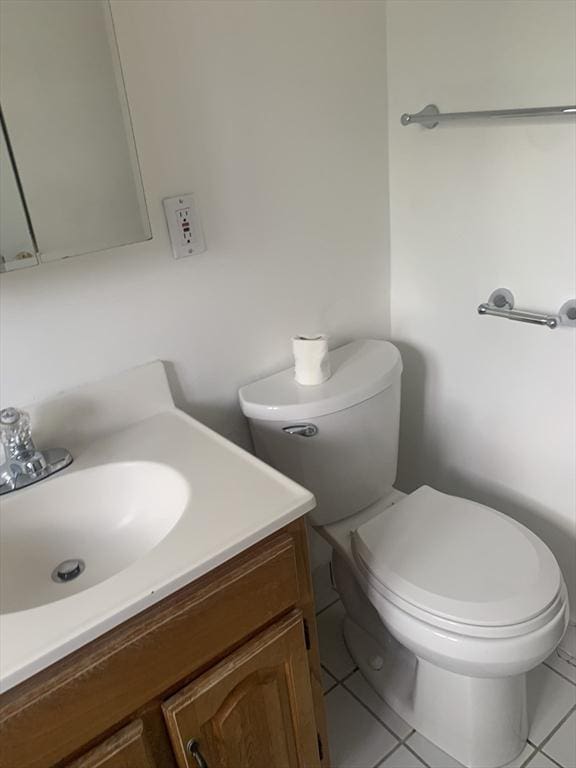 22 Bryon Rd Unit 3, Boston, MA 02467 - bathroom featuring tile patterned floors, vanity, and toilet