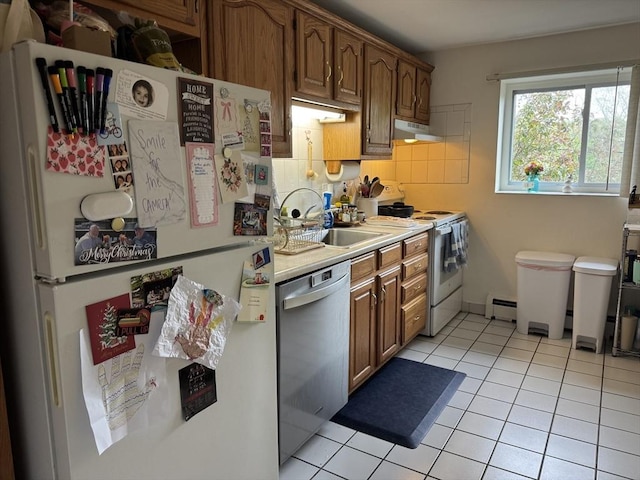 22 Bryon Rd Unit 3, Boston, MA 02467 - kitchen featuring white appliances, extractor fan, baseboard heating, light countertops, and light tile patterned flooring
