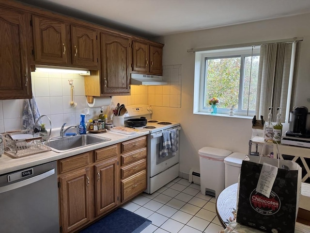 22 Bryon Rd Unit 3, Boston, MA 02467 - kitchen with electric range, stainless steel dishwasher, under cabinet range hood, light countertops, and a sink