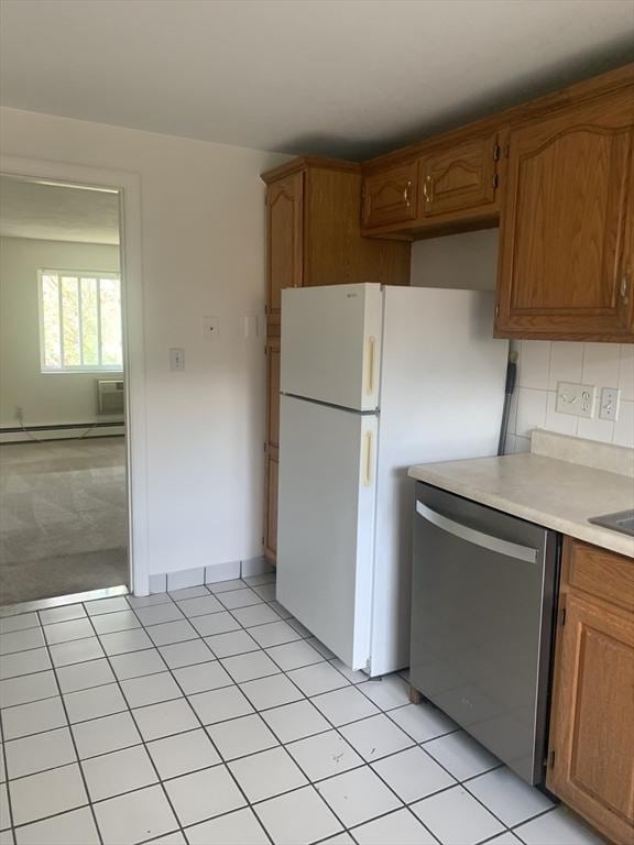 22 Bryon Rd Unit 3, Boston, MA 02467 - kitchen with stainless steel dishwasher, a baseboard heating unit, light countertops, brown cabinetry, and light colored carpet