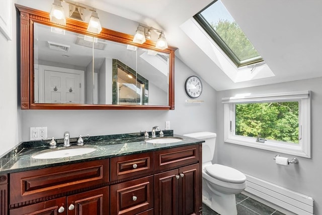 full bathroom with visible vents, vaulted ceiling with skylight, toilet, and a sink