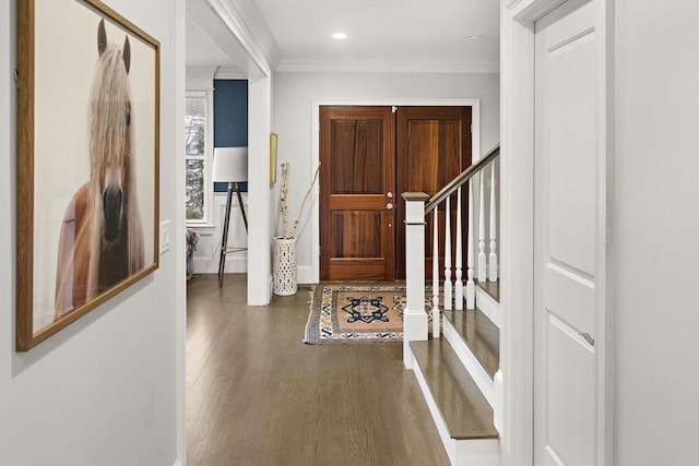 entryway featuring stairs, recessed lighting, wood finished floors, and crown molding