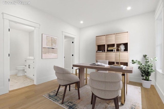 home office featuring light hardwood / wood-style floors