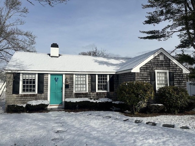 view of front of property featuring a chimney