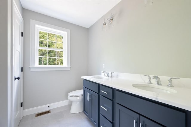 142 Tispaquin St, Middleboro, MA 02346 - full bath with baseboards, toilet, double vanity, and tile patterned flooring