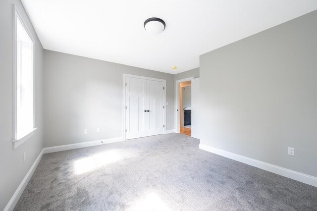 142 Tispaquin St, Middleboro, MA 02346 - unfurnished bedroom with carpet flooring, baseboards, and a closet
