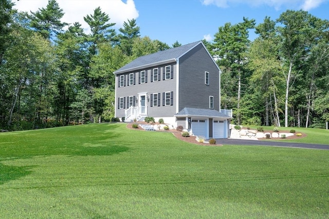 142 Tispaquin St, Middleboro, MA 02346 - view of front of property featuring an attached garage, driveway, a front lawn, and roof with shingles