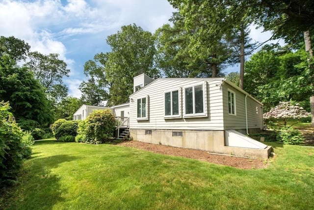 79 Myles View Dr, Duxbury, MA 02332 - view of side of property with a lawn and a chimney