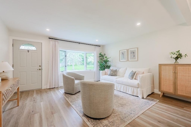 29 Regal St, Holliston, MA 01746 - living room with light wood finished floors, recessed lighting, and baseboards