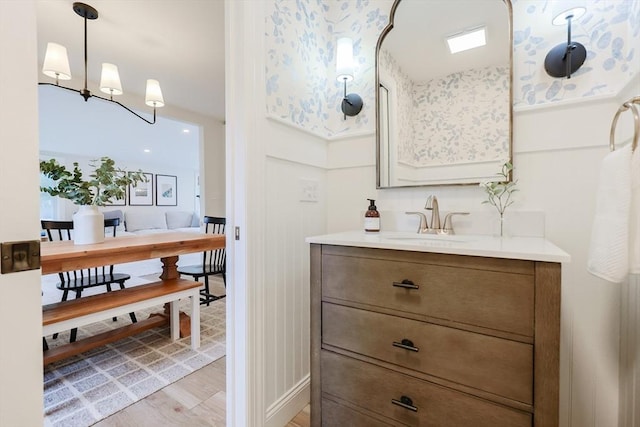 29 Regal St, Holliston, MA 01746 - bathroom featuring vanity and wood finished floors