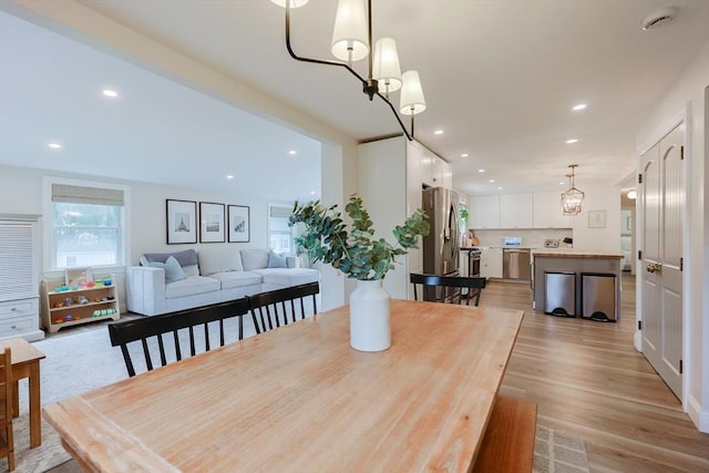 29 Regal St, Holliston, MA 01746 - dining space with a chandelier, light wood-type flooring, and recessed lighting