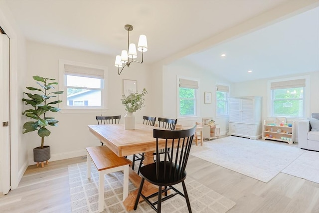 29 Regal St, Holliston, MA 01746 - dining space with light wood finished floors, a chandelier, lofted ceiling, baseboards, and recessed lighting