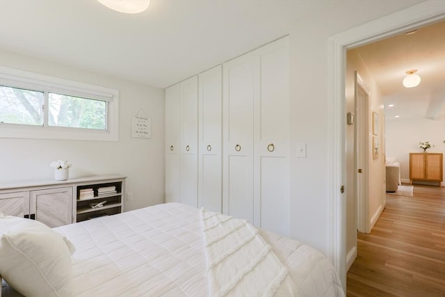 29 Regal St, Holliston, MA 01746 - bedroom with light wood-type flooring and baseboards