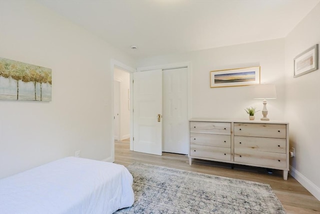 29 Regal St, Holliston, MA 01746 - bedroom featuring light wood-style flooring, baseboards, and a closet