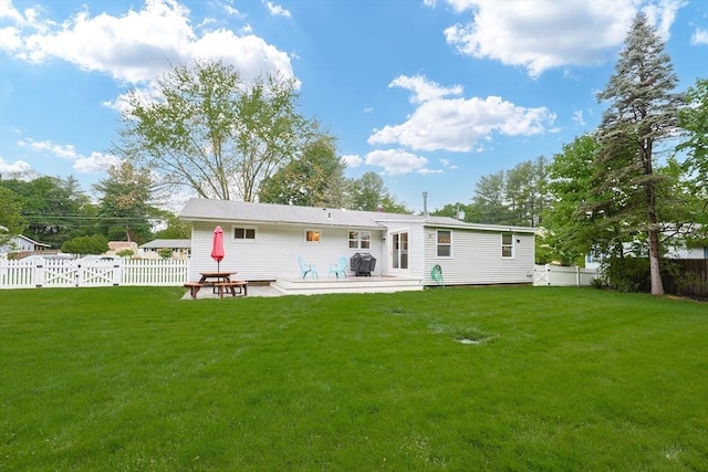 29 Regal St, Holliston, MA 01746 - back of property with a patio area