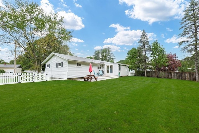 29 Regal St, Holliston, MA 01746 - rear view of property with a gate and a patio area