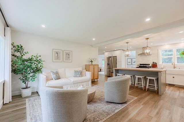 29 Regal St, Holliston, MA 01746 - living area featuring light wood-style flooring and recessed lighting