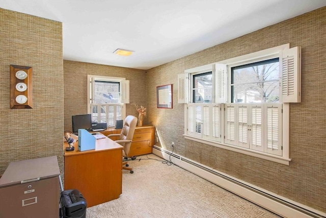 carpeted office with baseboard heating and wallpapered walls