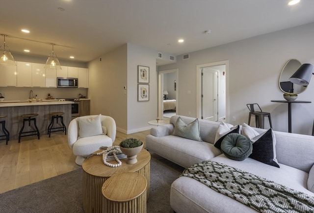 living room featuring light hardwood / wood-style flooring