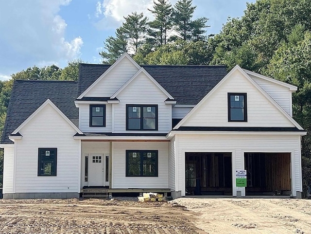 modern farmhouse with a garage