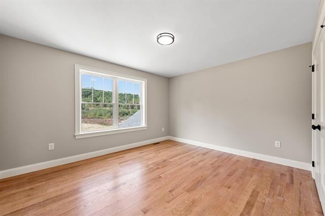 empty room featuring light hardwood / wood-style floors