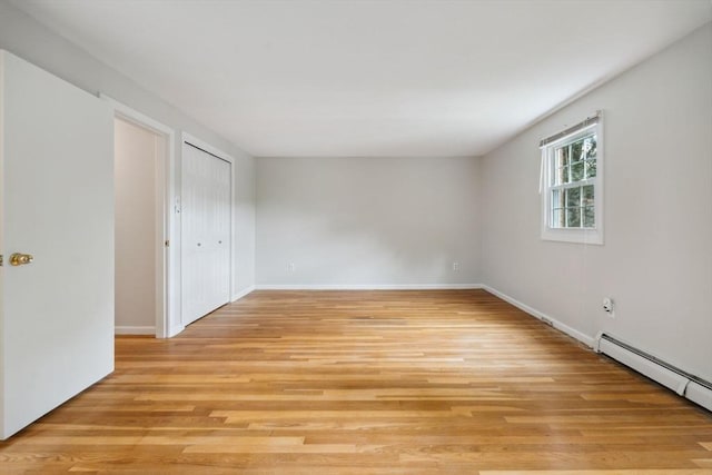 103 Central St, Newbury, MA 01922 - unfurnished room with a baseboard radiator and light wood finished floors