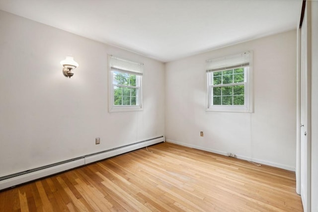 103 Central St, Newbury, MA 01922 - spare room featuring light wood-type flooring and baseboard heating
