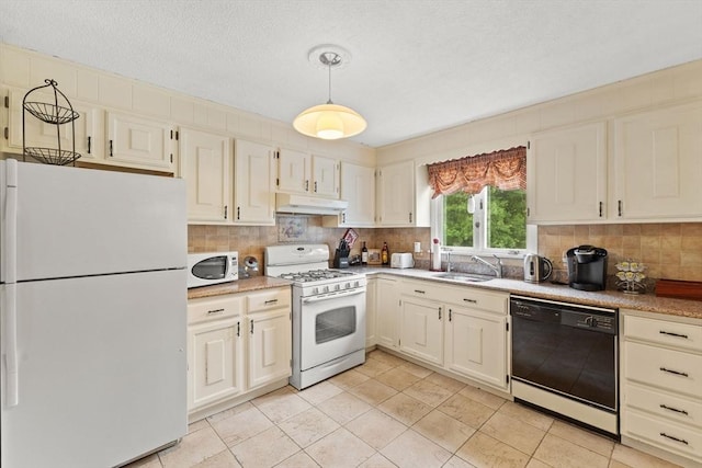 114 Cypress Dr, Swansea, MA 02777 - kitchen featuring white appliances, under cabinet range hood, decorative backsplash, hanging light fixtures, and light tile patterned flooring
