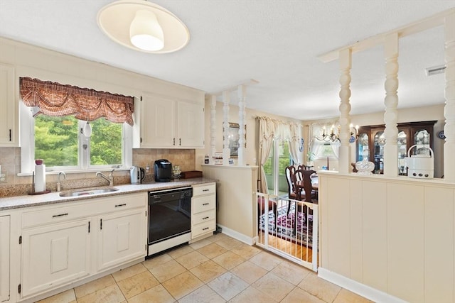 114 Cypress Dr, Swansea, MA 02777 - kitchen featuring dishwasher, backsplash, white cabinets, and a chandelier