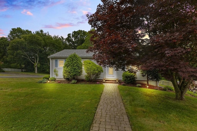 114 Cypress Dr, Swansea, MA 02777 - view of front facade with a front lawn