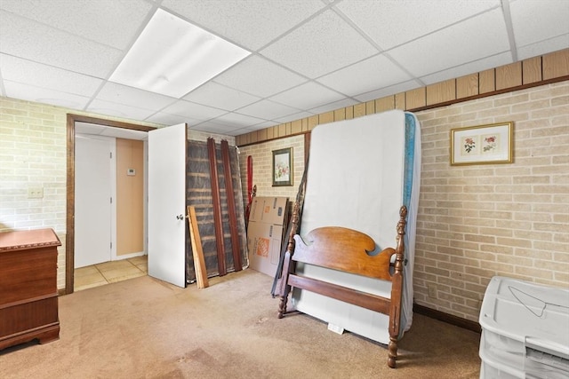 114 Cypress Dr, Swansea, MA 02777 - bedroom featuring brick wall, carpet, and a paneled ceiling