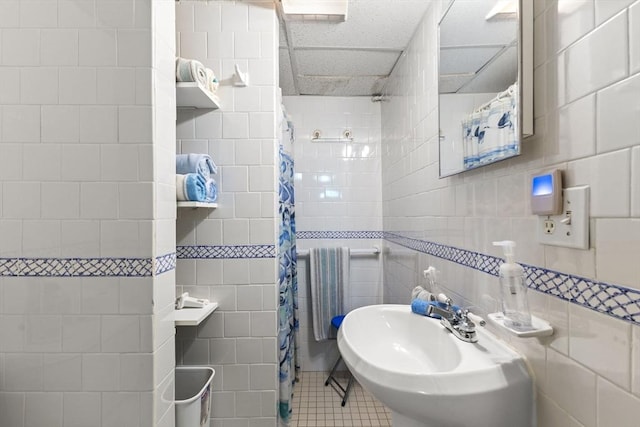 114 Cypress Dr, Swansea, MA 02777 - full bath featuring tile walls, a tile shower, and tile patterned floors