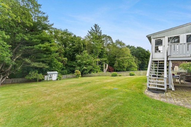 114 Cypress Dr, Swansea, MA 02777 - fenced backyard featuring a shed and stairway
