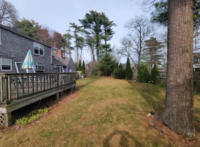 51 Nye Ln, Bourne, MA 02532 - view of green lawn with a wooden deck